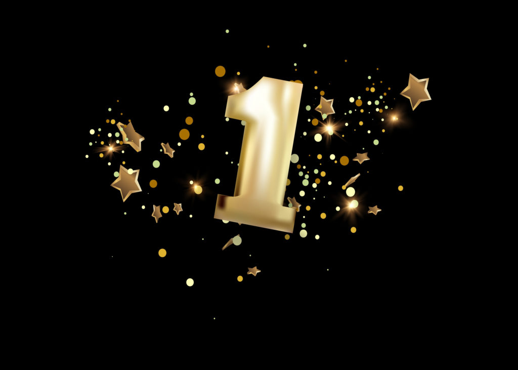 First,Anniversary,Celebration.,Golden,Number,1,With,Sparkling,Confetti,,Stars,