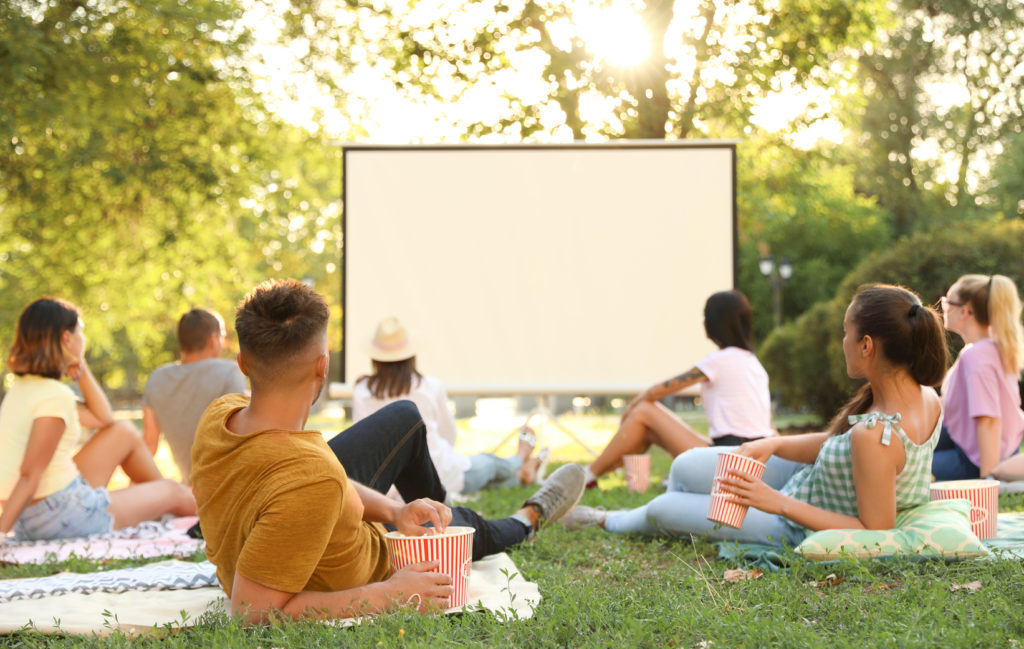 Young,People,Watching,Movie,In,Open,Air,Cinema.,Space,For